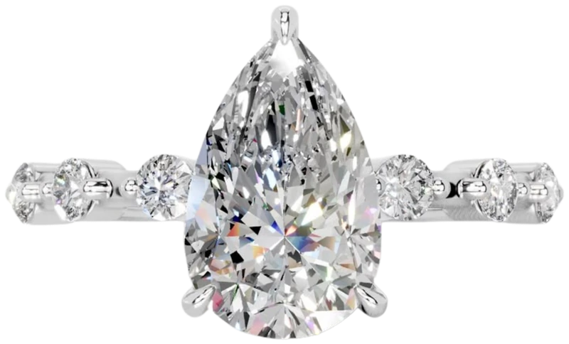 Pear diamond ring with side diamonds