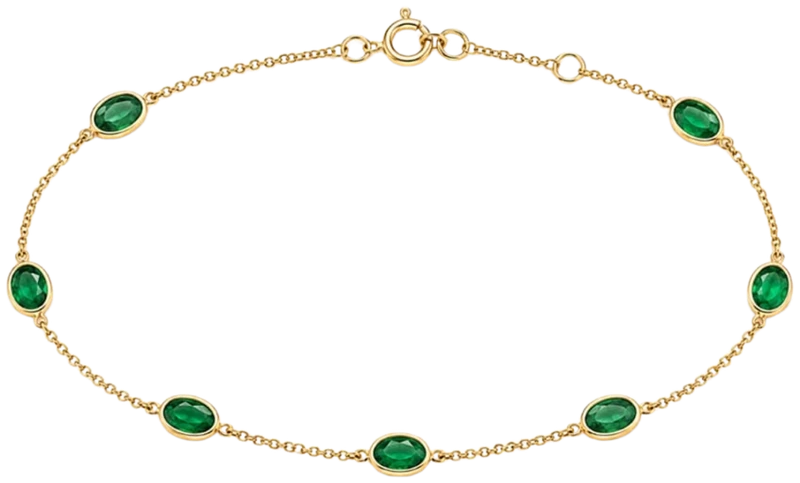 Emerald station bracelet in yellow gold